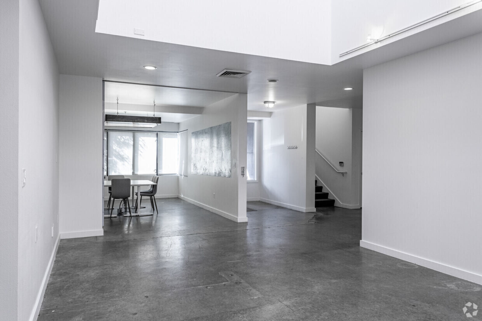 Sun-filled central atrium with skylights at 1815 Slabtown creative office Portland OR